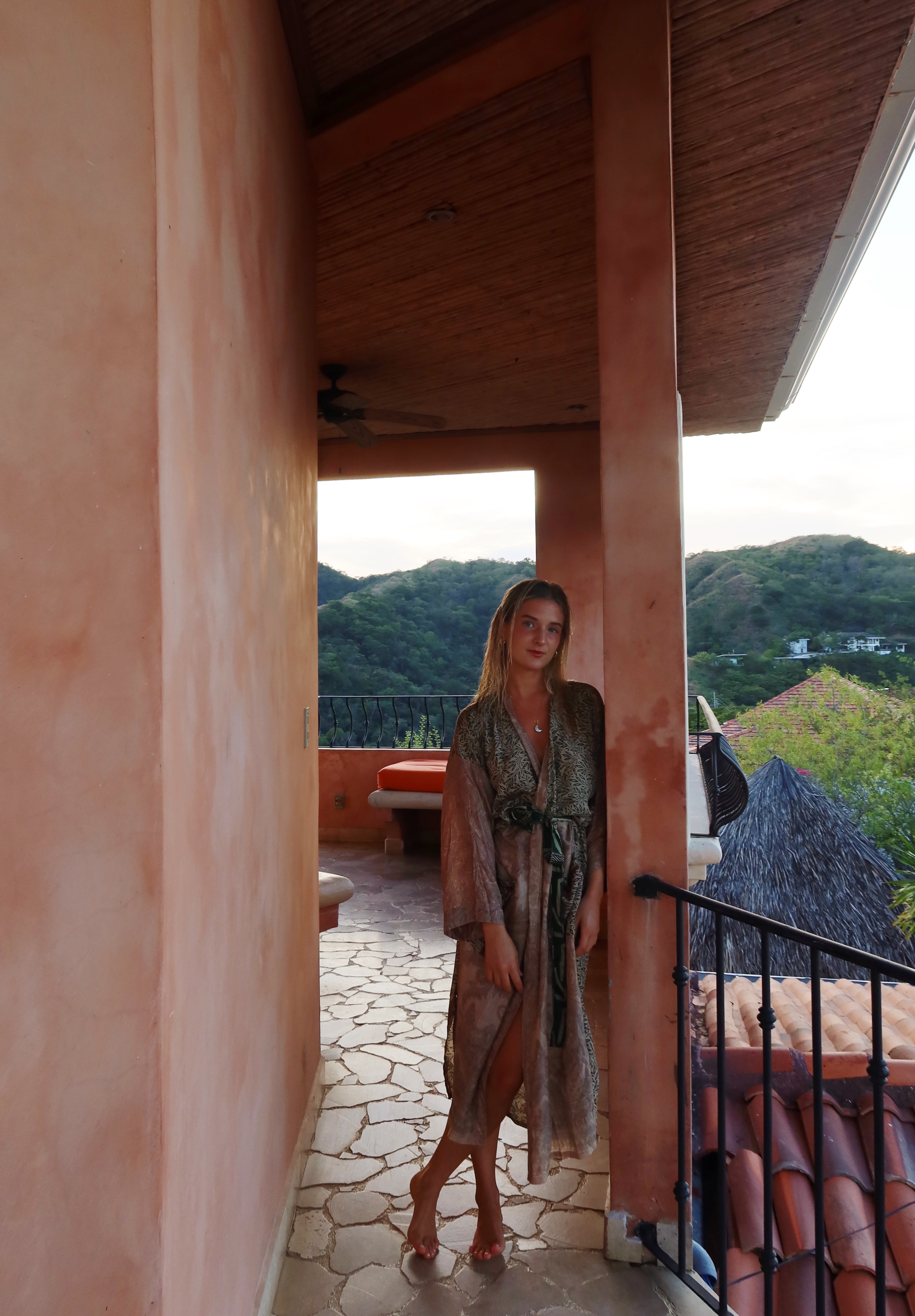 Lucy in peaceful meditation with mountains